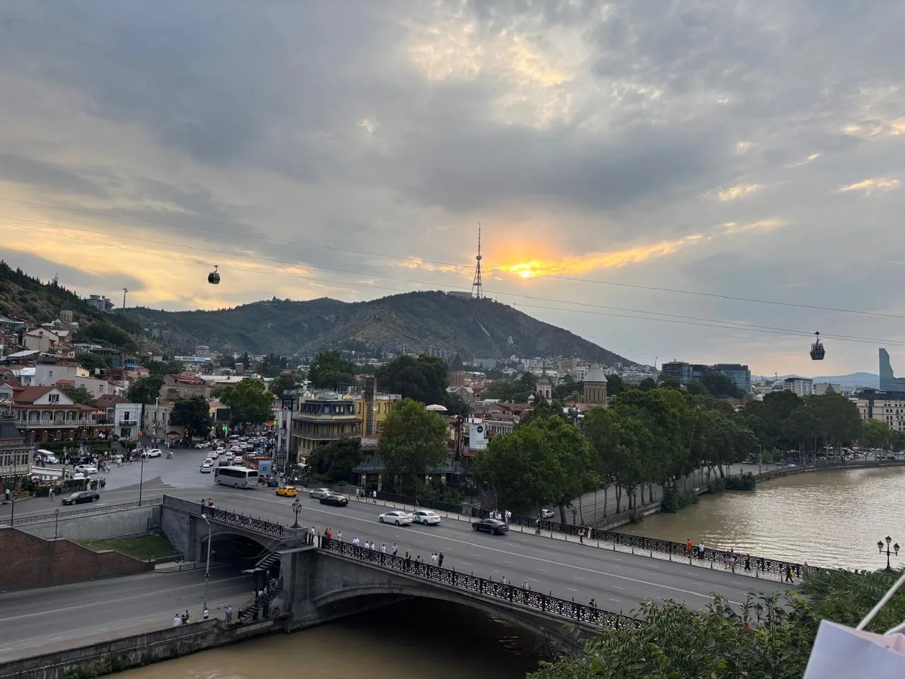 Tbilisi at sunset by the Mtkvari River